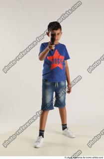 TIMBO STANDING POSE WITH GUN
